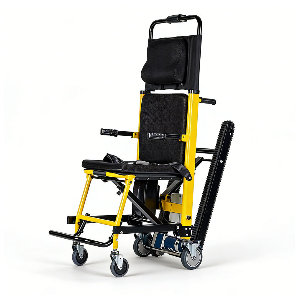 Yellow and black stair climbing wheelchair fully unfolded at a three-quarter angle, showing the padded headrest, mesh backrest, flip-up armrests, footrest and rubber climbing track